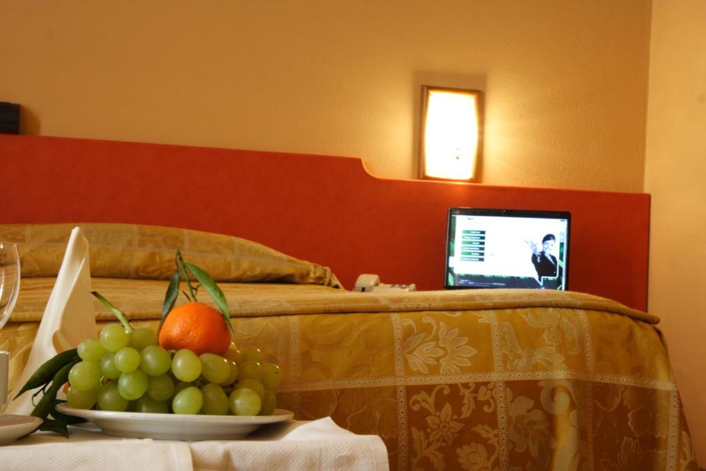TV a/nebo společenská místnost v ubytování Hotel Tre Torri