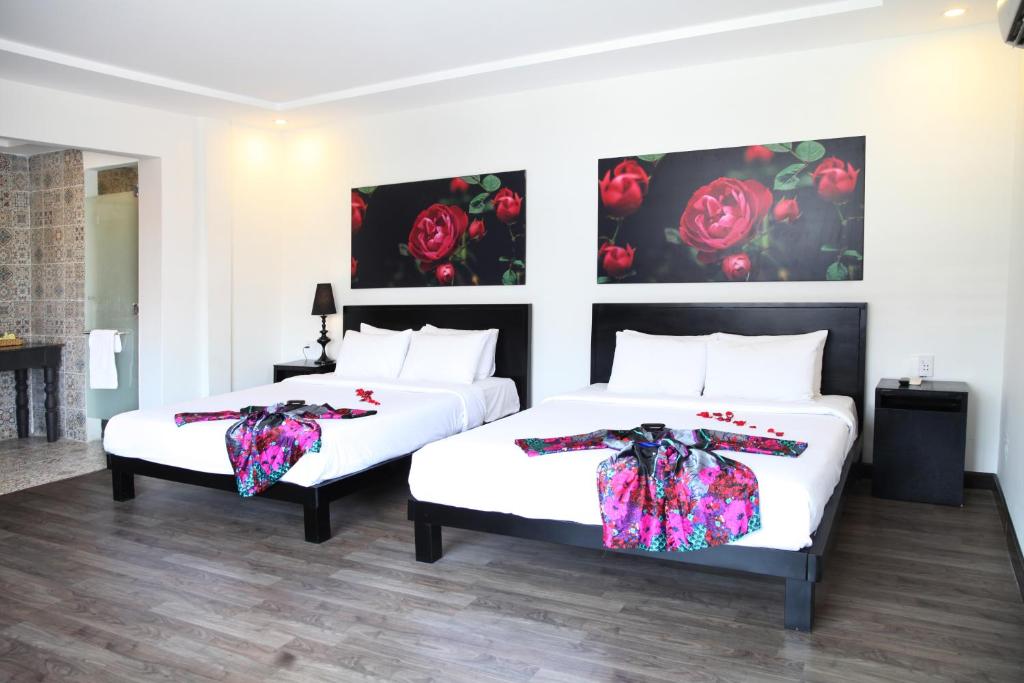 Postel nebo postele na pokoji v ubytování Thanh Binh 2 Hotel