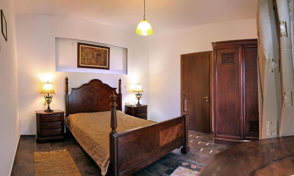 Postel nebo postele na pokoji v ubytování Malemi Organic Hotel