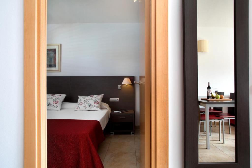 Posteľ alebo postele v izbe v ubytovaní Aparthotel Bardon