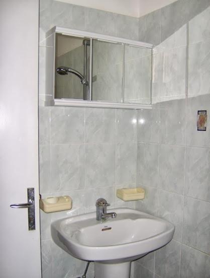 Koupelna v ubytování Hotel Moja