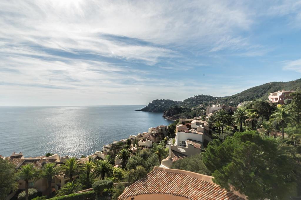 a view of the ocean from a resort at Hôtel Club Port La Galère in Théoule-sur-Mer