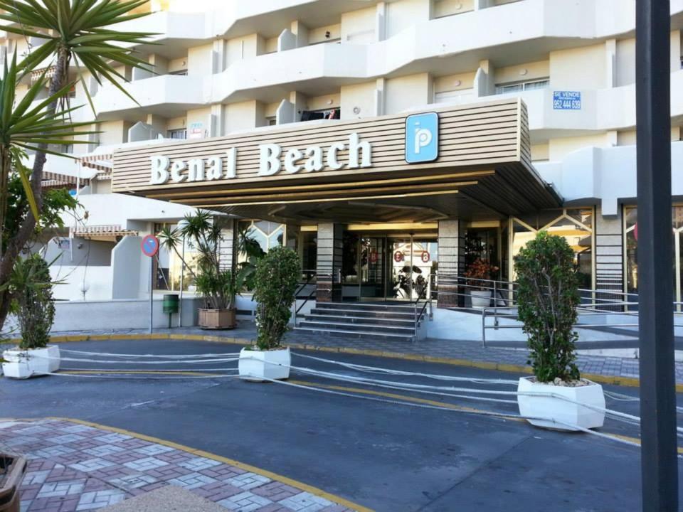 a building with a sign on the front of it at Benal Beach in Málaga