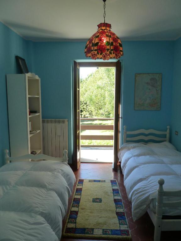 Postel nebo postele na pokoji v ubytování Casa Vacanza Pratolungo