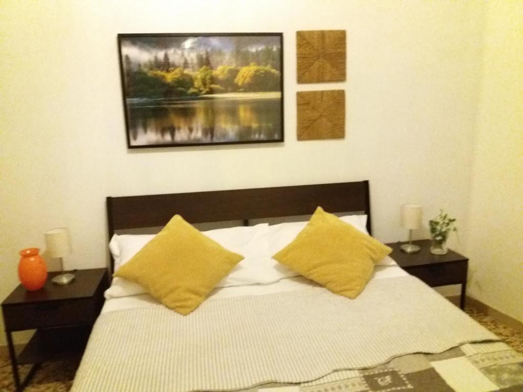 Postel nebo postele na pokoji v ubytování Near To Pisa Airport Guest-House