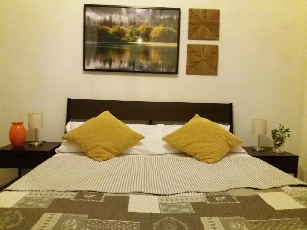 Postel nebo postele na pokoji v ubytování Near To Pisa Airport Guest-House