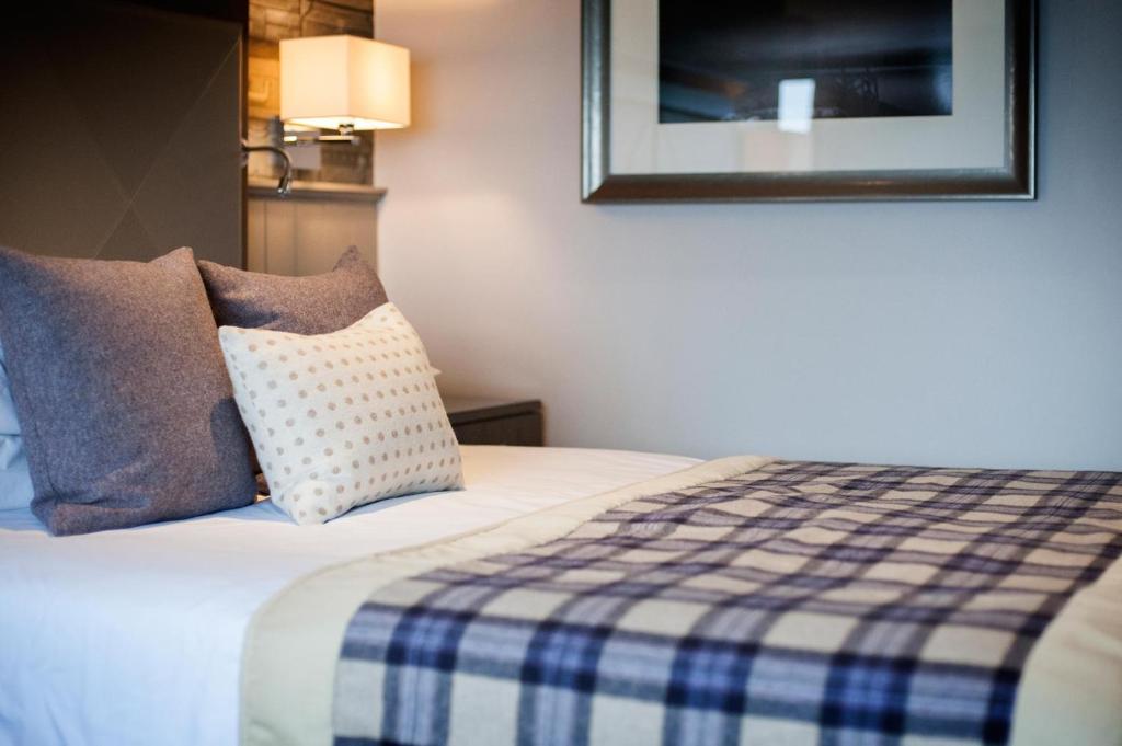 Postel nebo postele na pokoji v ubytování Seamill Hydro Hotel