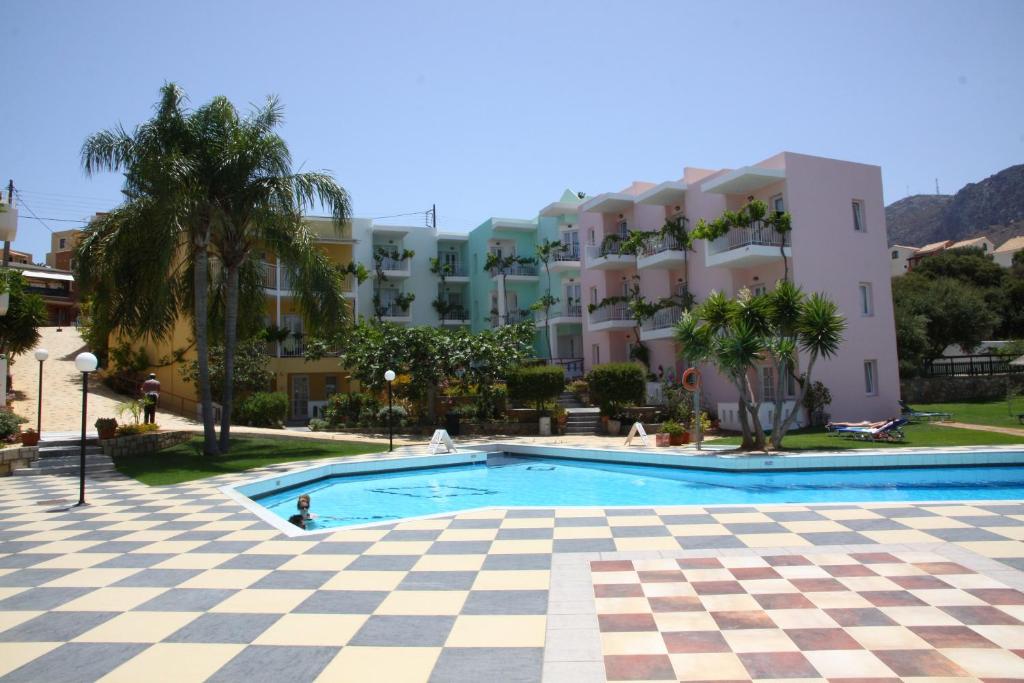 Bazén v ubytování Bellos Hotel Apartments nebo v jeho okolí