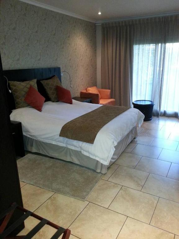 Postel nebo postele na pokoji v ubytování Planet Hotel HollyBum