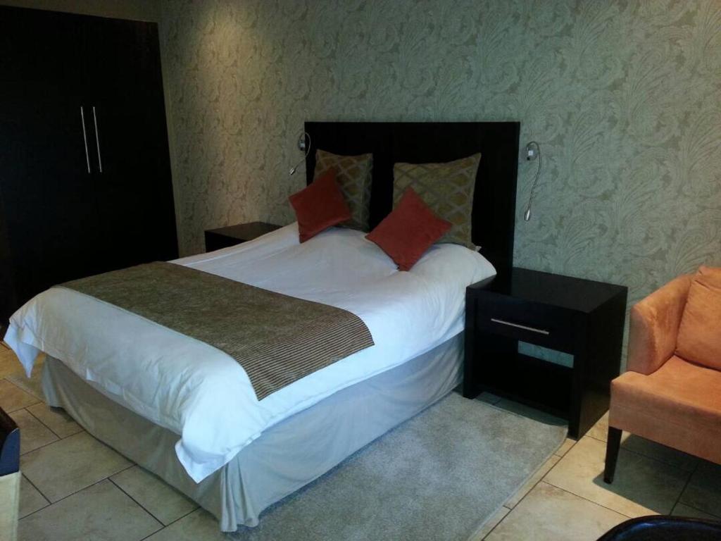 Postel nebo postele na pokoji v ubytování Planet Hotel HollyBum