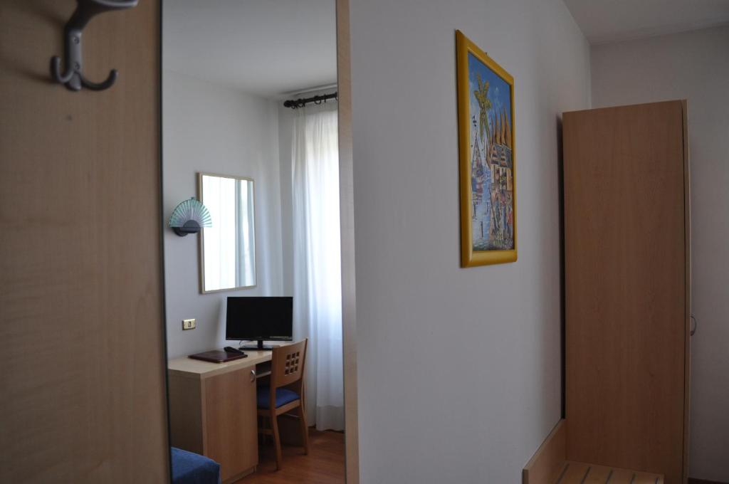 TV a/nebo společenská místnost v ubytování Hotel Igea