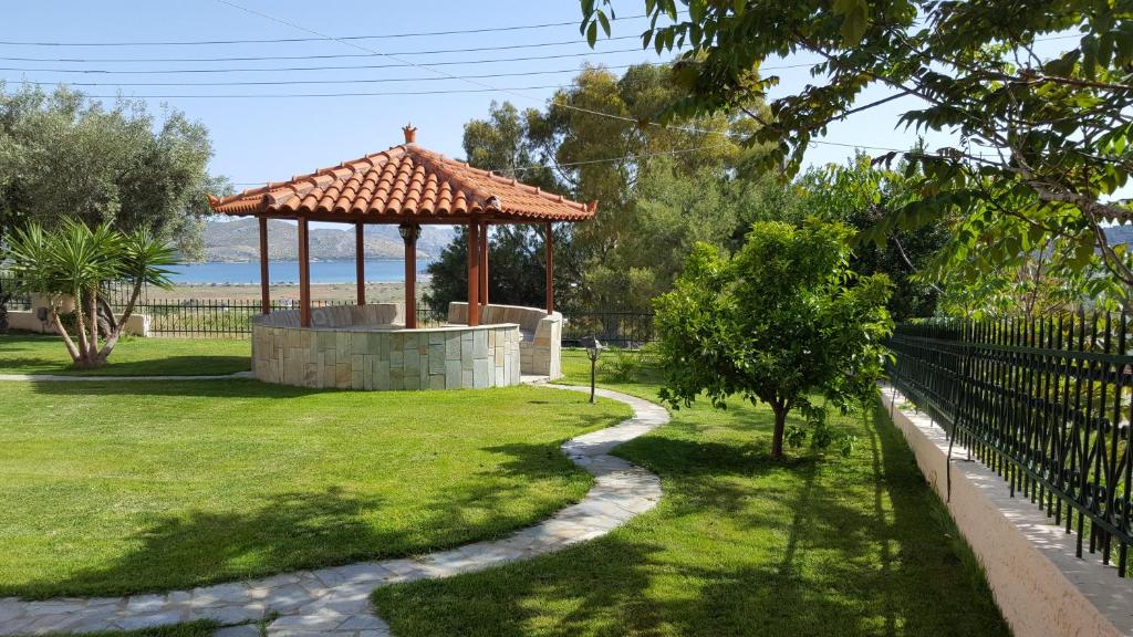 a gazebo in a park with a path at Villa Christina in Anavyssos