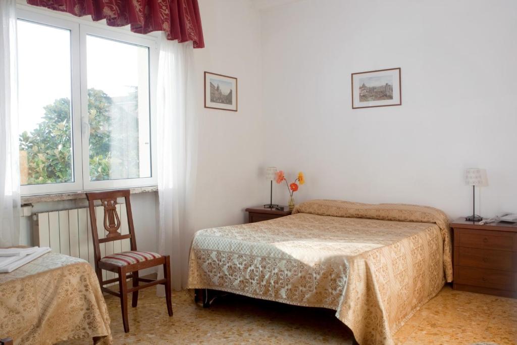 Postel nebo postele na pokoji v ubytování Hotel Antico Acquedotto