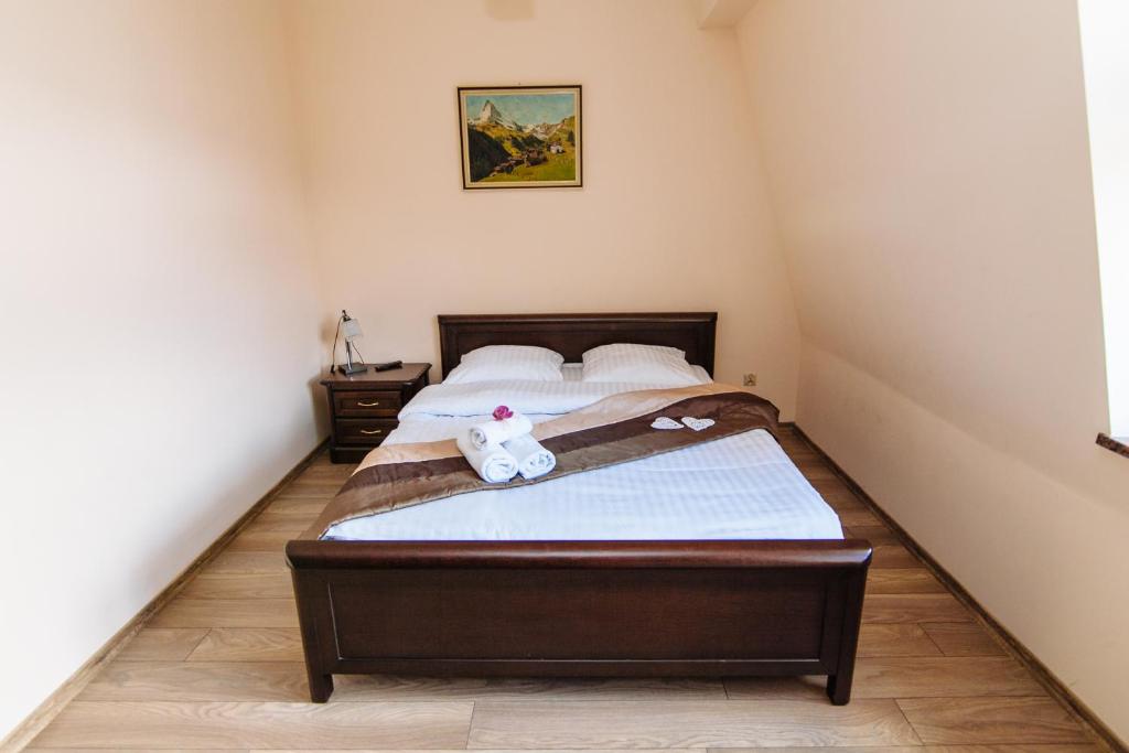 Posteľ alebo postele v izbe v ubytovaní Willa Pan Tadeusz