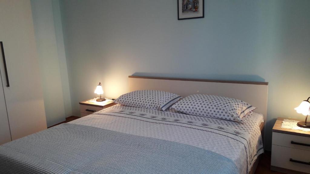 Postel nebo postele na pokoji v ubytování Apartment Marisa