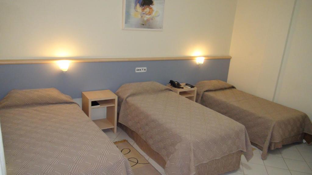 Postel nebo postele na pokoji v ubytování Asppen Hotel