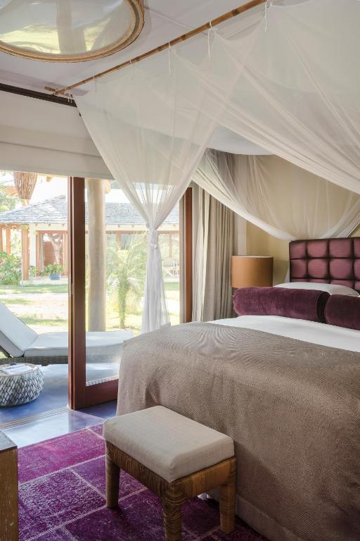 Postel nebo postele na pokoji v ubytování Campo Bahia Hotel Villas Spa
