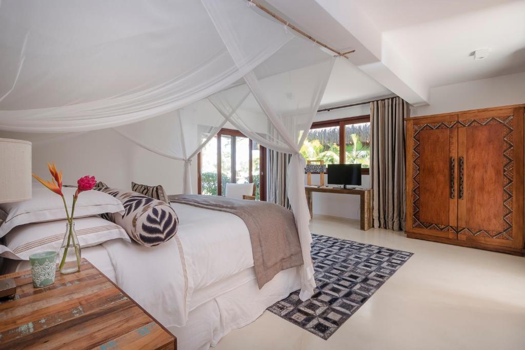 Postel nebo postele na pokoji v ubytování Campo Bahia Hotel Villas Spa