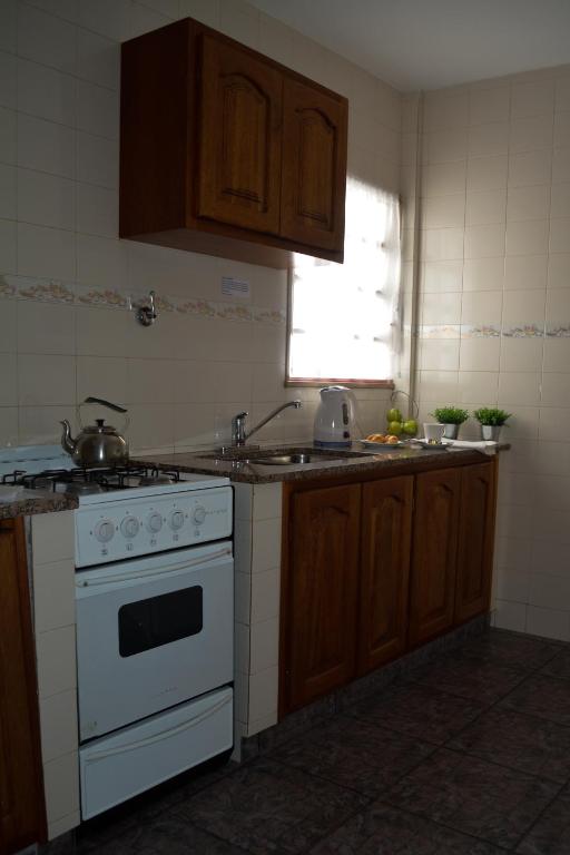 Kuchyň nebo kuchyňský kout v ubytování Argenta Apart Hotel