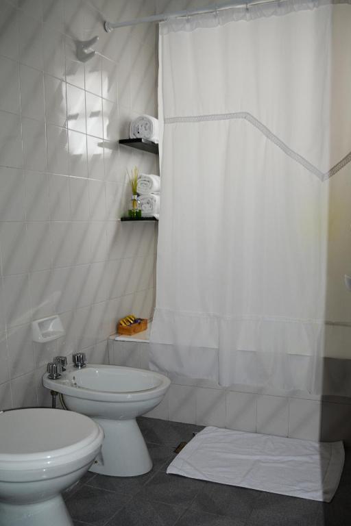 Koupelna v ubytování Argenta Apart Hotel