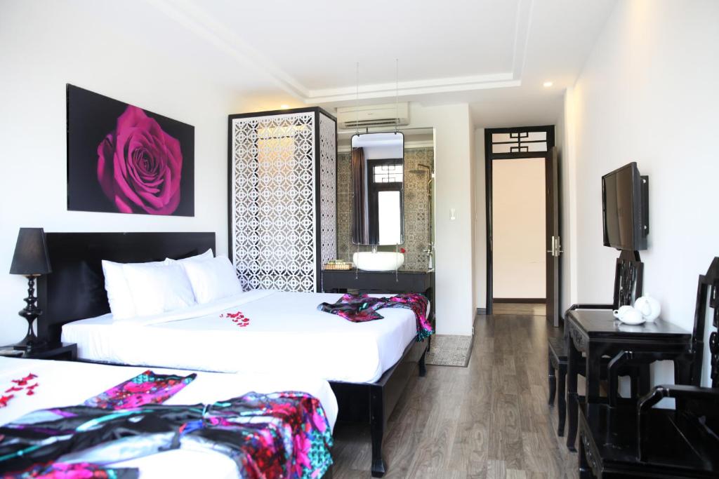Postel nebo postele na pokoji v ubytování Thanh Binh 2 Hotel