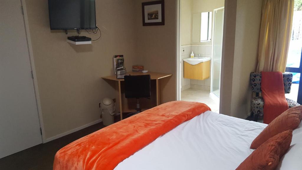 Postel nebo postele na pokoji v ubytování Heta Road B&B