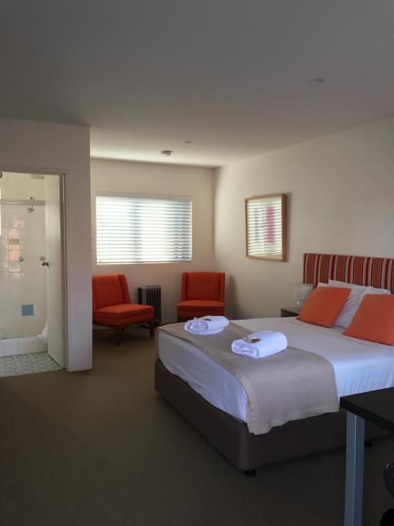 Postel nebo postele na pokoji v ubytování Thirroul Beach Motel