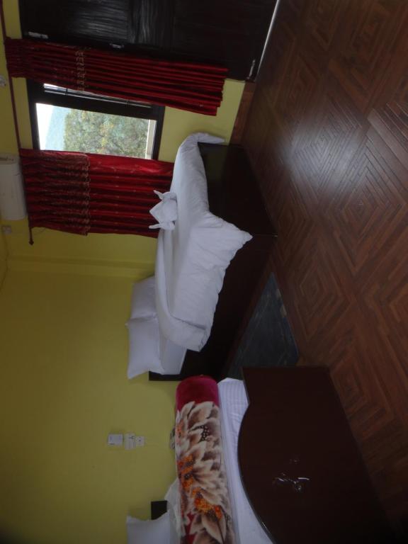 Letto o letti in una camera di Trekkers Lodge