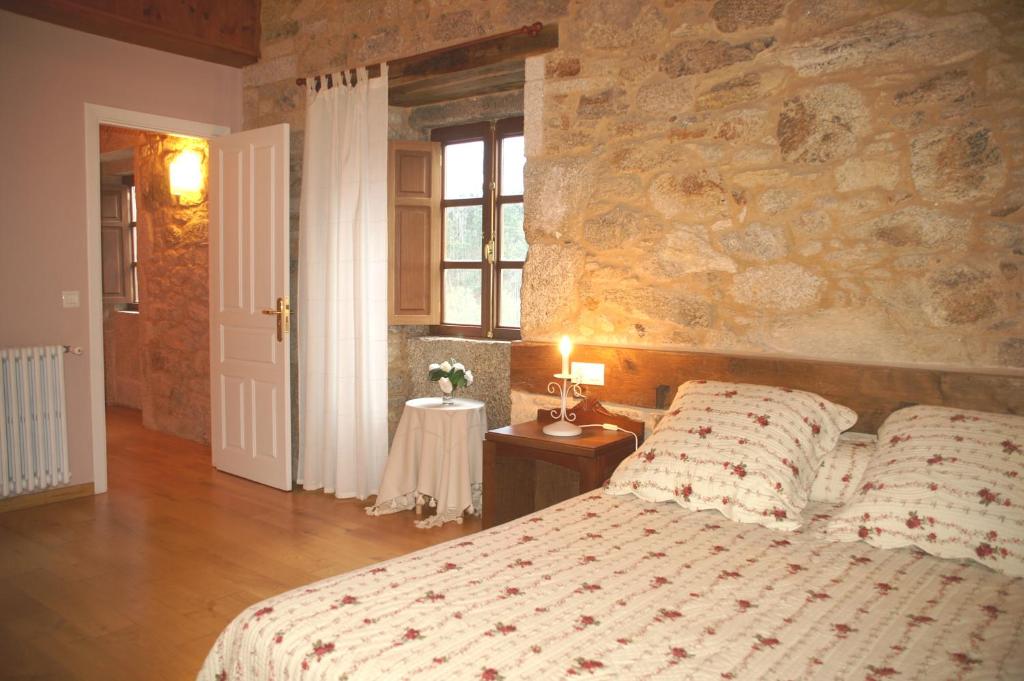 Cama o camas de una habitación en Casa Rural Graña da Acea