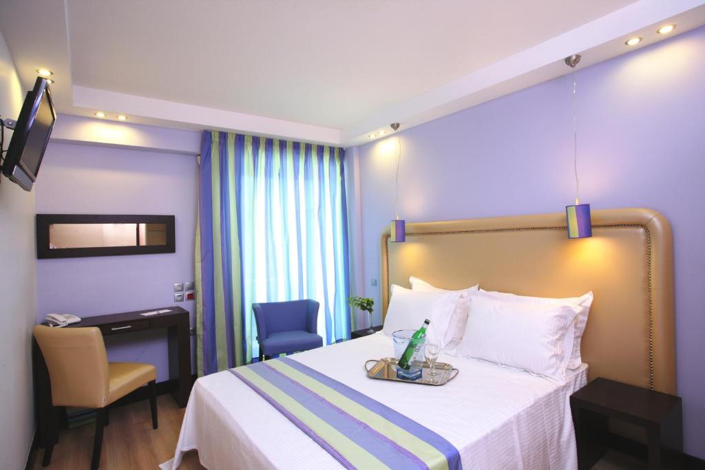 A bed or beds in a room at Olympic Palladium