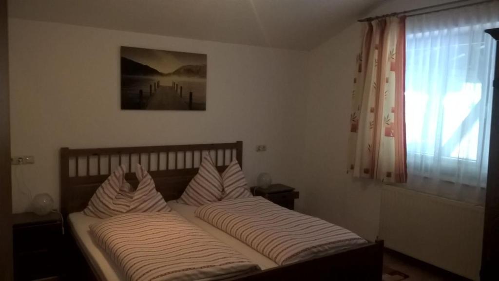 Postel nebo postele na pokoji v ubytování Ferienhaus Moser