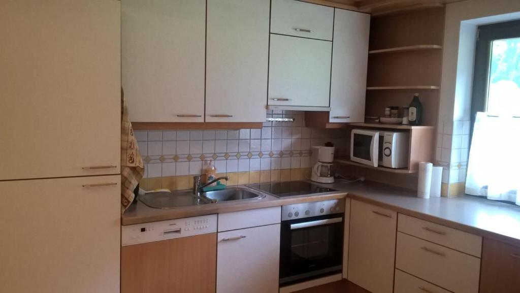 Kuchyň nebo kuchyňský kout v ubytování Ferienhaus Moser