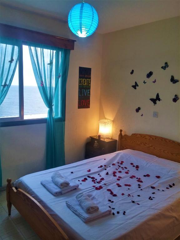 Postel nebo postele na pokoji v ubytování 777 Beach Guesthouse