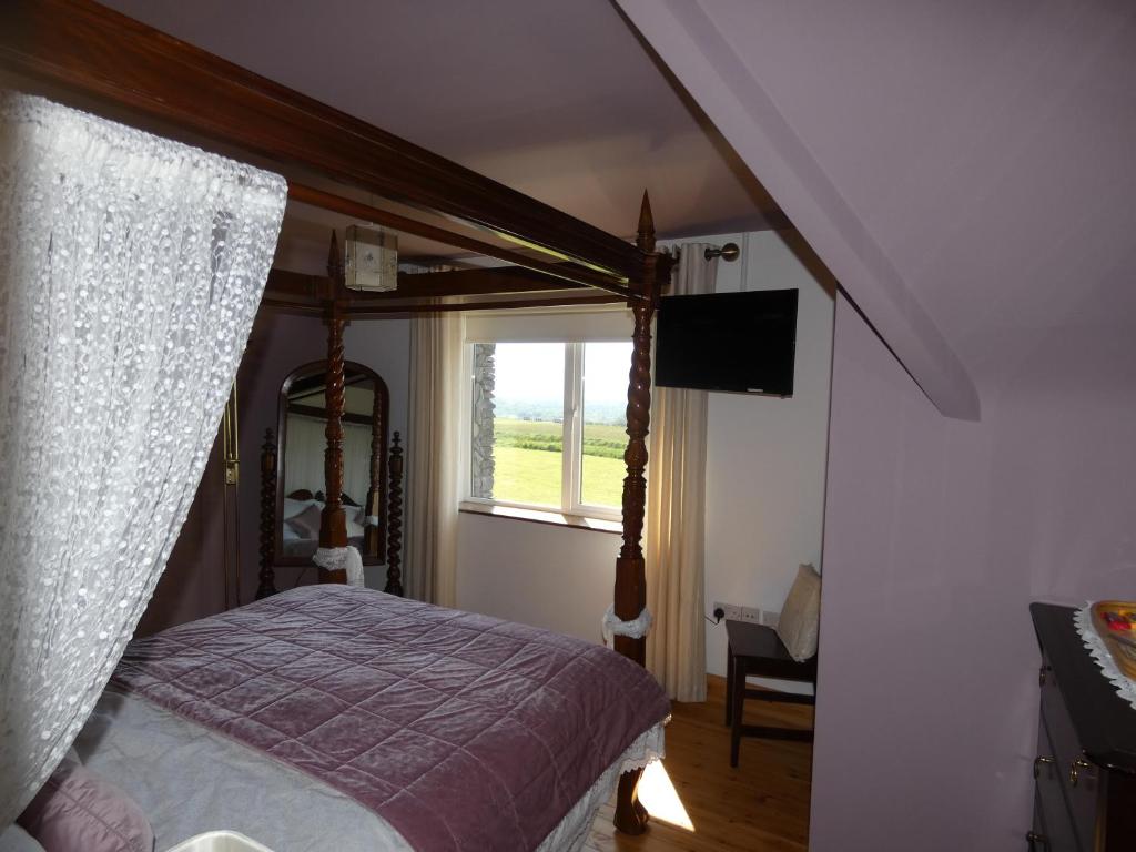 Postel nebo postele na pokoji v ubytování Aghadoe View Bed & Breakfast