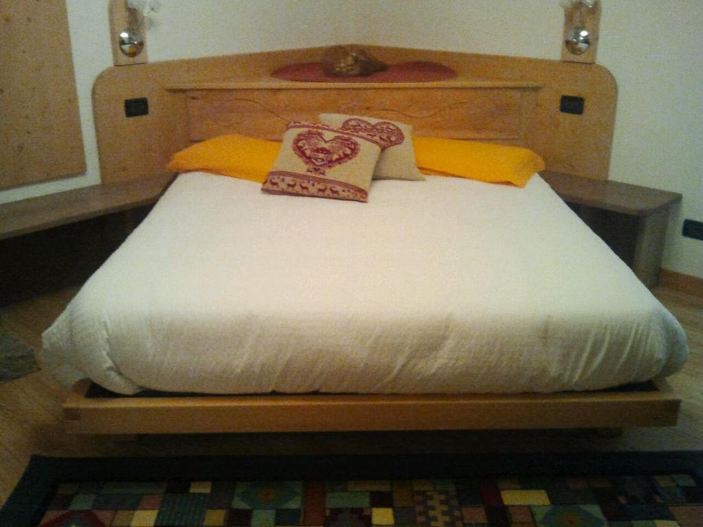 Cama o camas de una habitación en B&B Chalet ai Mulini