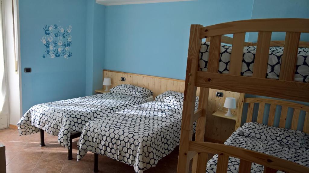 Katil atau katil-katil dalam bilik di Casa Luca e Cristina
