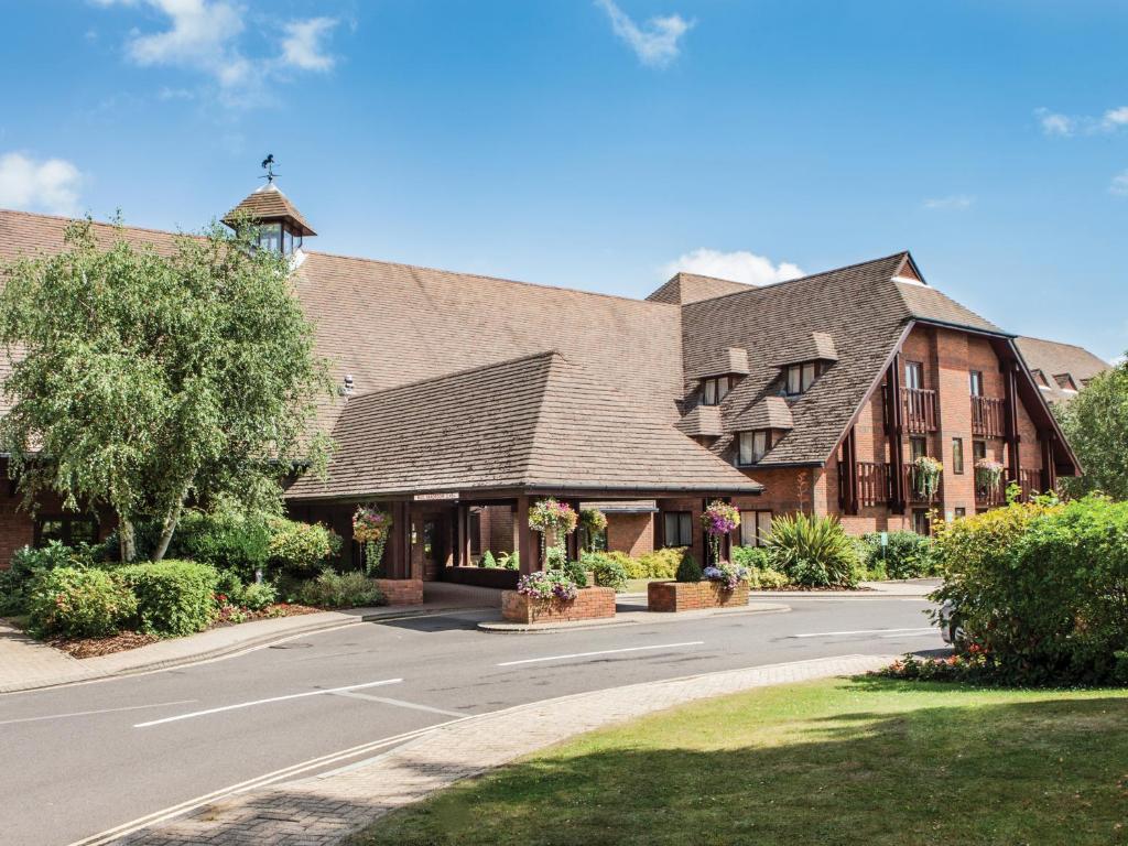 a large building with a road in front of it at Solent Hotel and Spa in Fareham