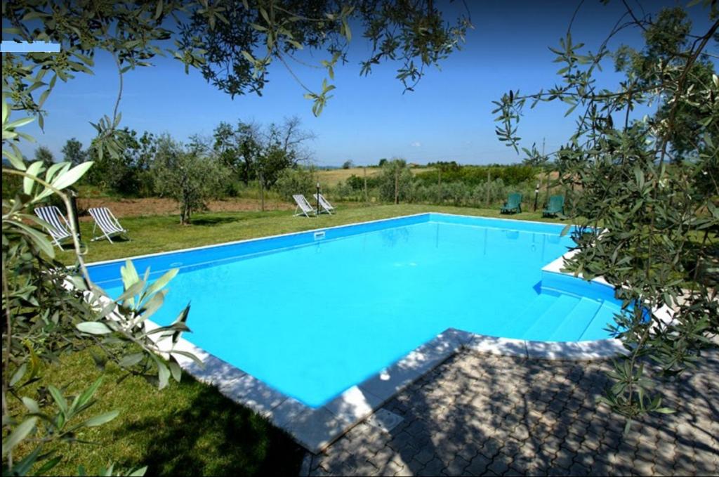 Bazén v ubytovaní Country House Maremma Nel Tufo alebo v jeho blízkosti
