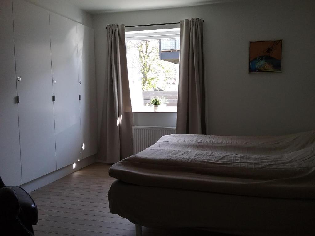 Postel nebo postele na pokoji v ubytování Hals Hotel ferielejlighed