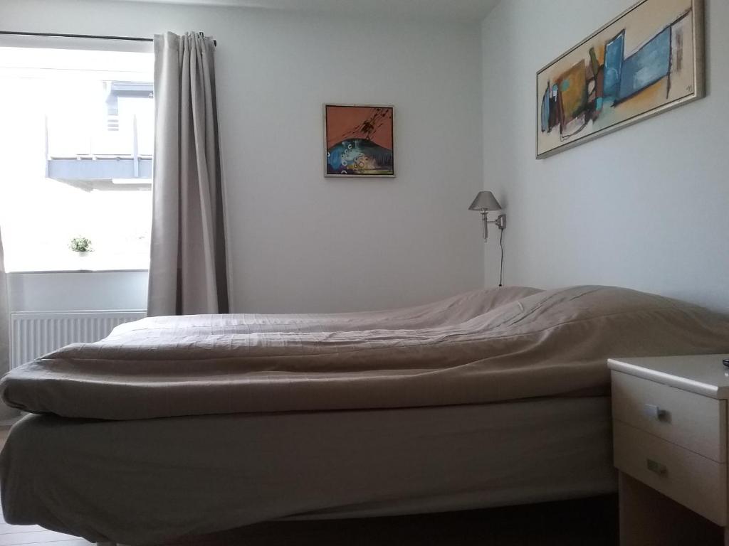 Postel nebo postele na pokoji v ubytování Hals Hotel ferielejlighed