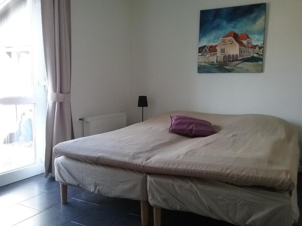 Postel nebo postele na pokoji v ubytování Hals Hotel ferielejlighed
