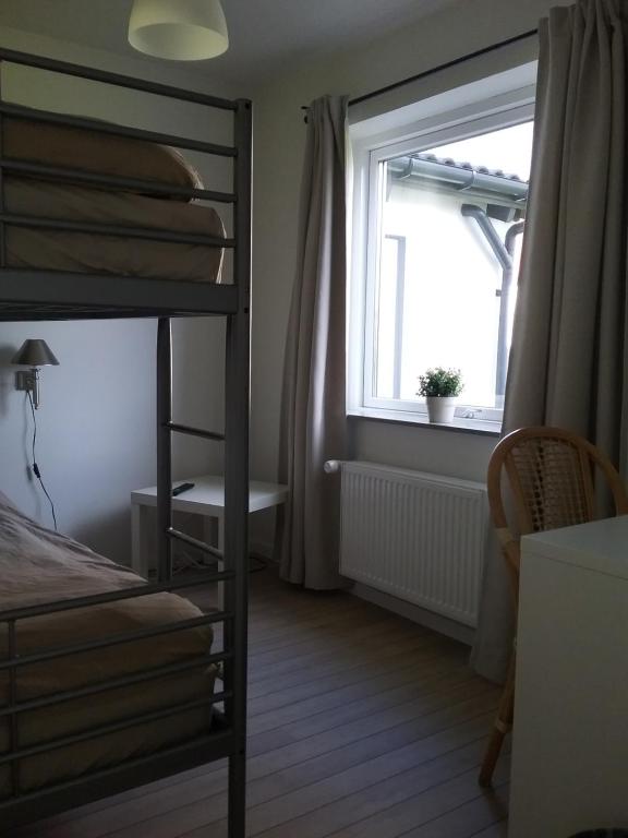 Postel nebo postele na pokoji v ubytování Hals Hotel ferielejlighed