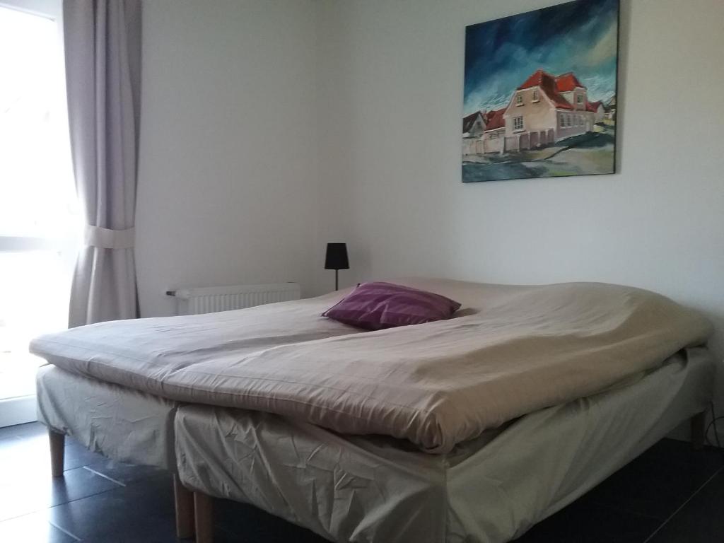 Postel nebo postele na pokoji v ubytování Hals Hotel ferielejlighed