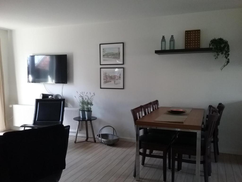 TV a/nebo společenská místnost v ubytování Hals Hotel ferielejlighed