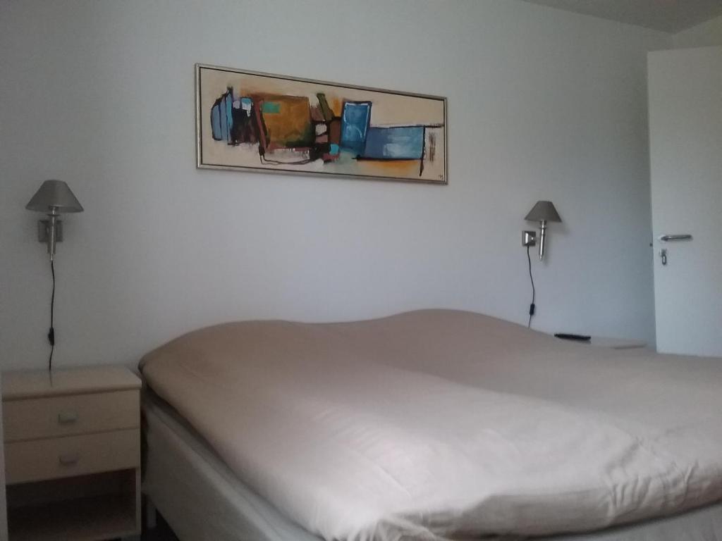 Postel nebo postele na pokoji v ubytování Hals Hotel ferielejlighed