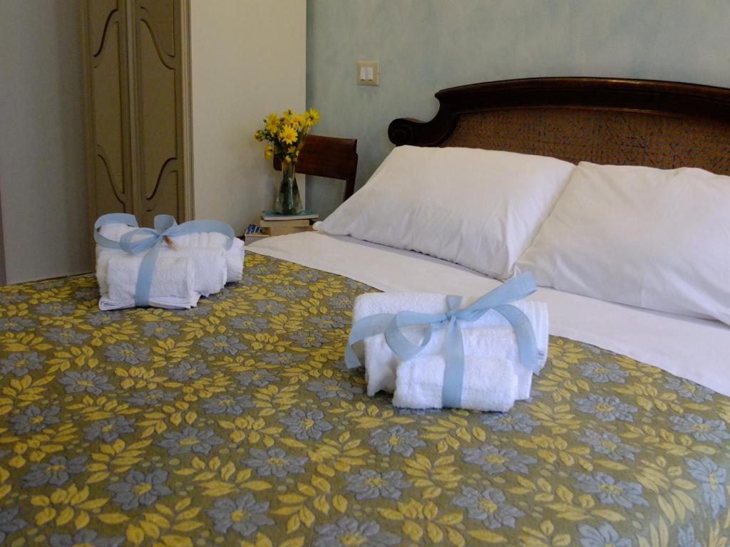 A bed or beds in a room at Incanto delle Ninfe
