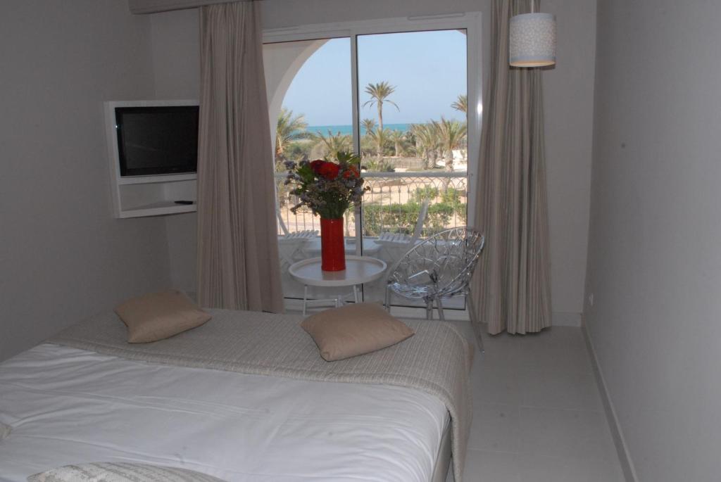 Postel nebo postele na pokoji v ubytování Seabel Rym Beach Djerba