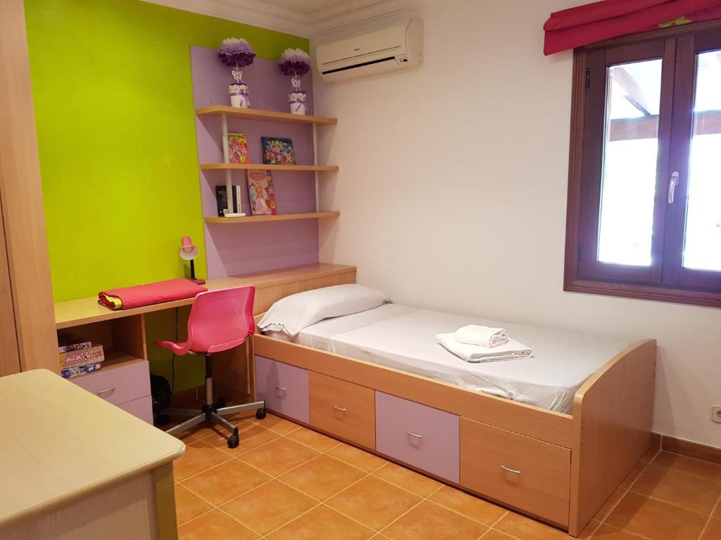 Postel nebo postele na pokoji v ubytování Finca Miralles