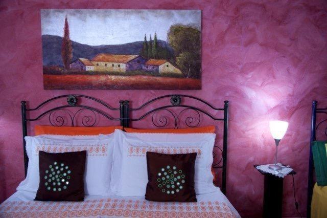 Postel nebo postele na pokoji v ubytování B&B Kore