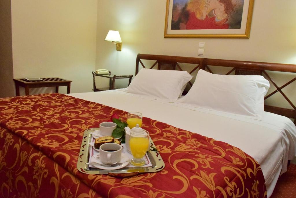Postel nebo postele na pokoji v ubytování Hotel Galaxias